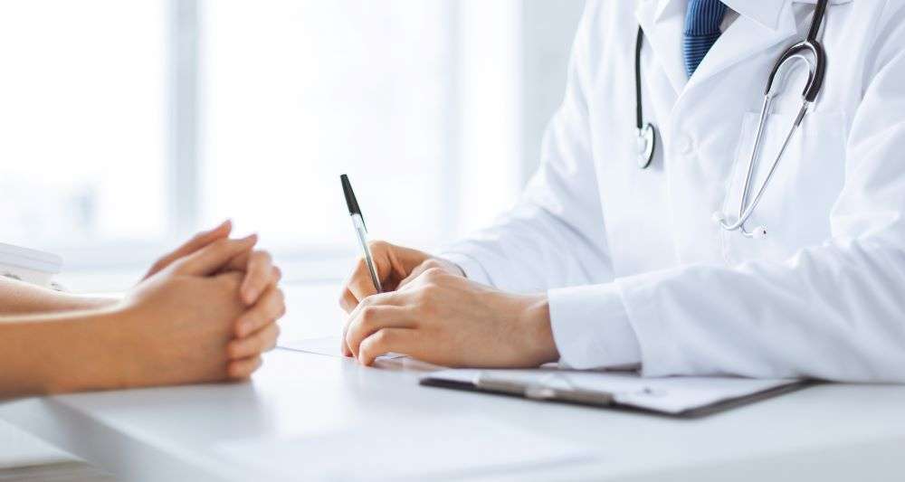 doctor taking notes
